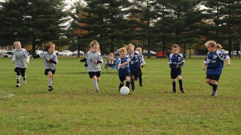 children playing soccer